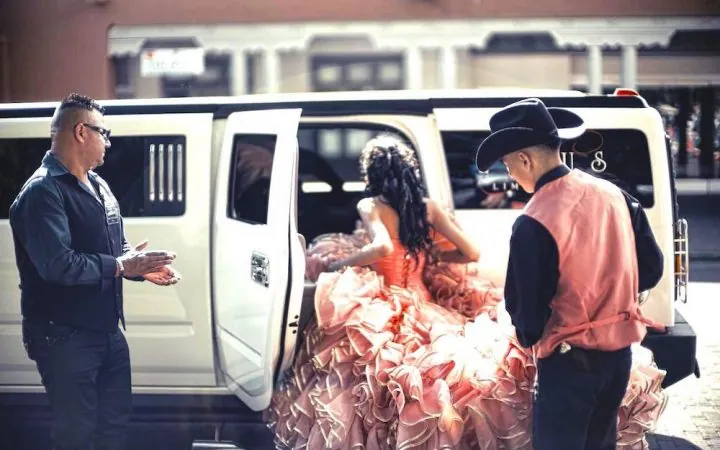 Quinceañera with a stretch limousine
